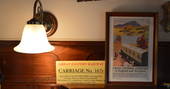 Lighting and decor inside The Victorian Railway Carriage at Coppins Farm 