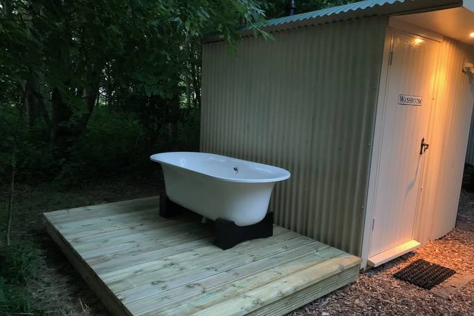 The Shepherds Hut at Kenton Hall outdoors bath tub