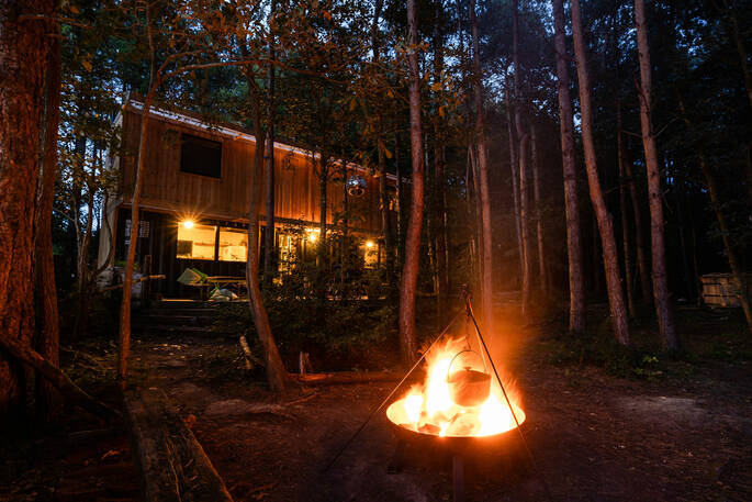 Nighttime firepit and cabin