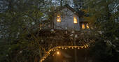 The Buzzardry treehouse fairy lights, Rushlake Green, Sussex, England