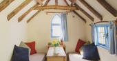 The fresh, bright interior of Meadow keeper's cottage in Sussex