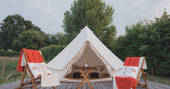 Book a one-off, unique experience at the Hill Top Tent at Swallowtail Hill, Sussex