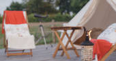 Book a romantic specially cooked meal for two at the Hill Top Tent at Swallowtail Hill, in Sussex