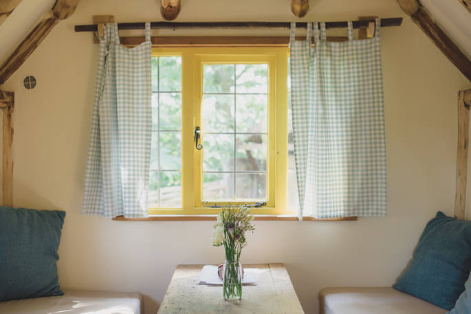 Sit with your morning coffee and look out the window at Woodcutter's Cottage in Sussex