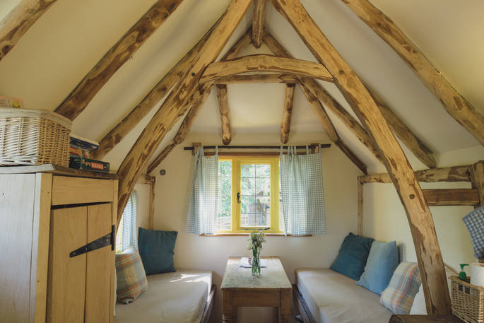 The wood-crafted interior of Woodcutter's Cottage in Sussex