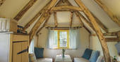 The wood-crafted interior of Woodcutter's Cottage in Sussex
