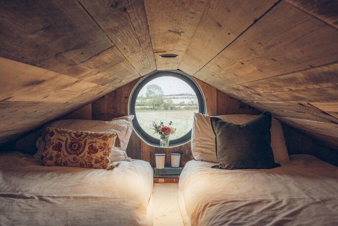 Two single beds up on the mezzanine
