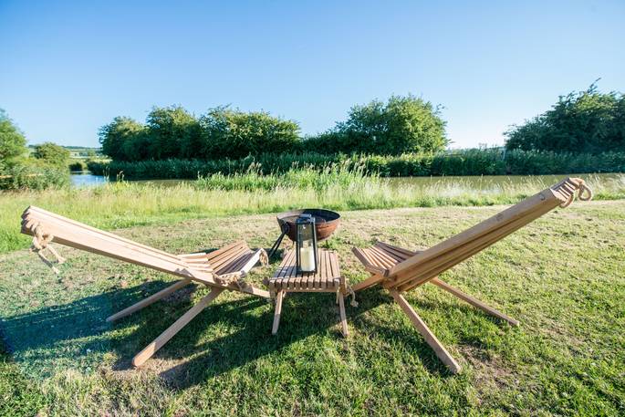 Cook al fresco on the BBQ outside your own tipi, Slinket, at Hill Farm Glamping