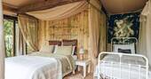Sleeping tent with a double bed, single bed and a bunk bed