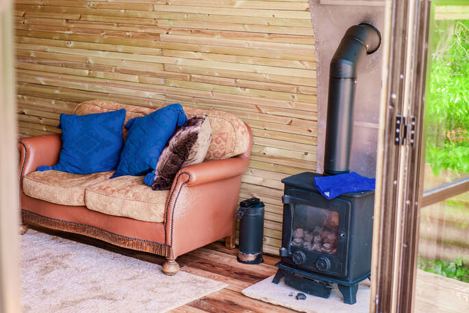 Sofa and wood burner