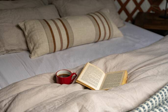 Coffee and a book in bed