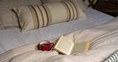 Coffee and a book in bed