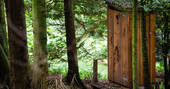 Exterior of the compost loo on ground level at Puckshipton Tree house in Wiltshire 