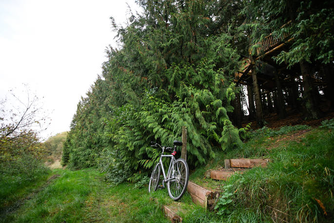 Park your bike up by the tree's near the steps leading to Puckshipton Tree house 