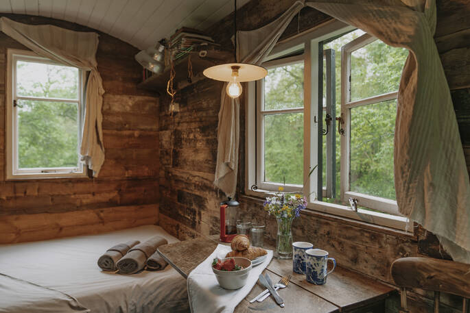 Joan's Hut Shepherd's hut interior, Stourport on seven, Worcestershire, England,