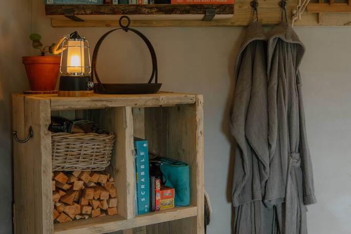 Bath robes, lantern and board games provided