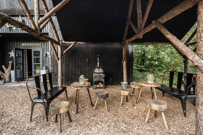 Communal seating outside the Woodshed at North Star Club in Yorkshire