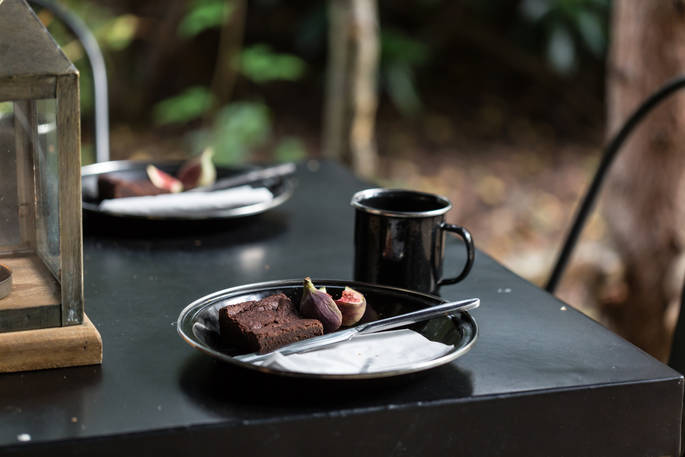 Delicious brownie, figs and a hot drink on the table at Whitby cabin, North Star Club