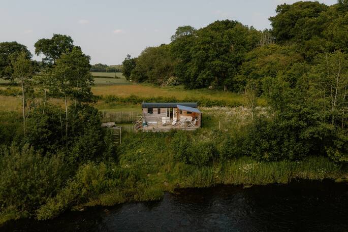 View of hut from across the river