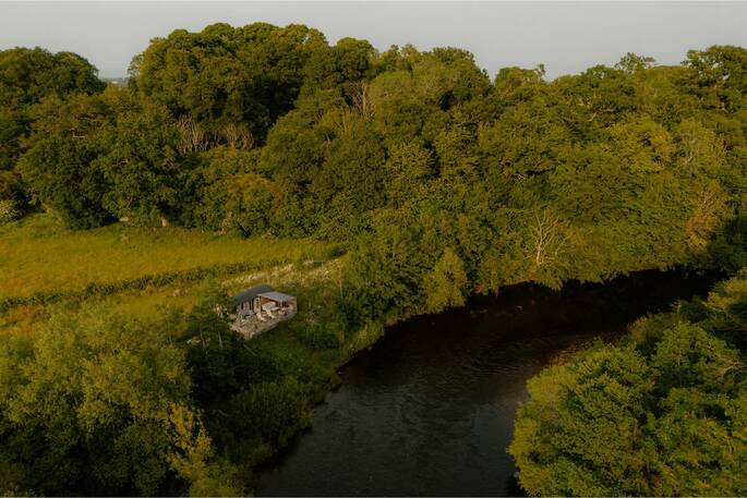 View of shepherds hut and river from above