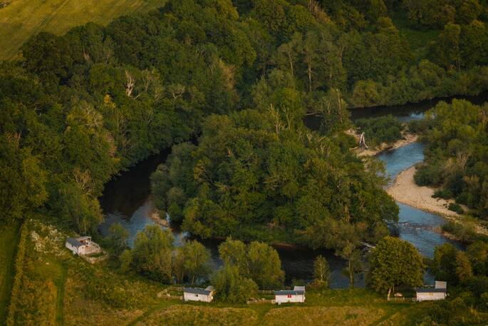 View of huts and river from above