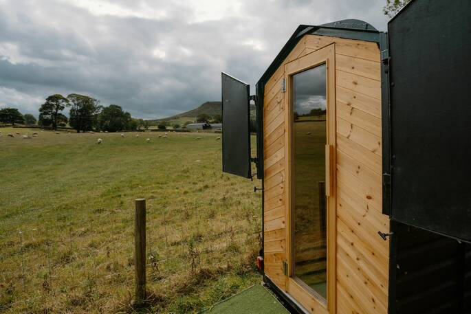 Sauna next to field