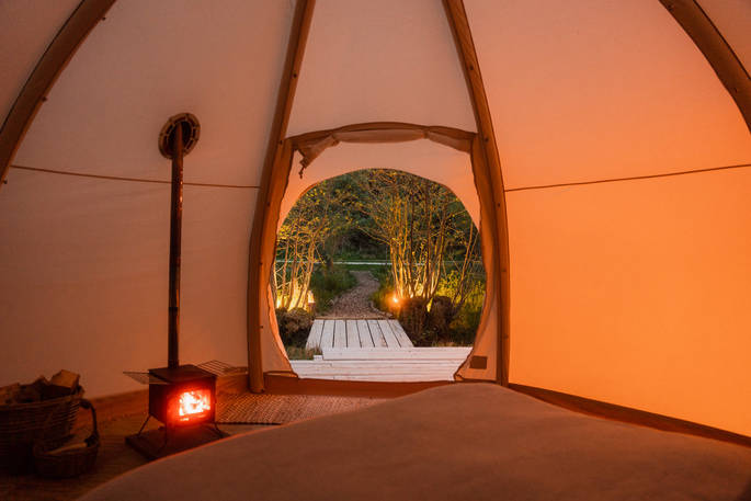Beck bell tent view from the bed during the night, The Lazy T at Old Byland, York, Yorkshire