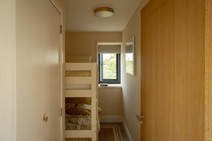 Bunk room with two single beds