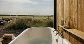 Outdoor bath tub with a view