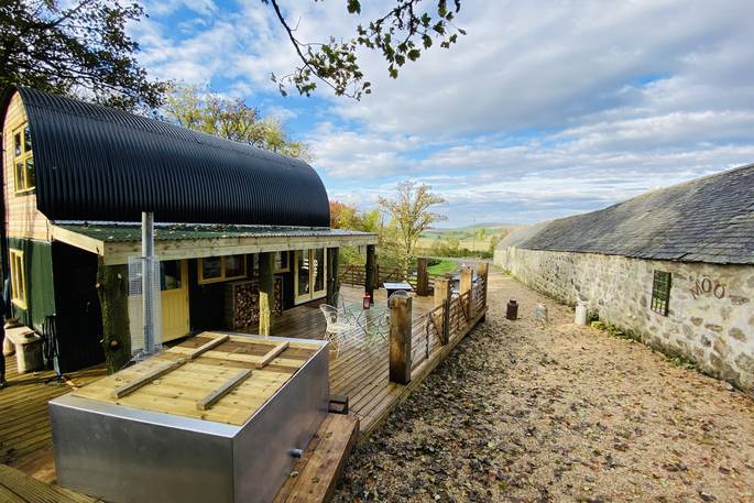 The Dairy at Denend exterior with square hot tub, Boutique Farm Bothies at Huntly, Aberdeenshire