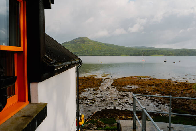 Douglas Boathouse exterior view of loch