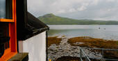 Douglas Boathouse exterior view of loch