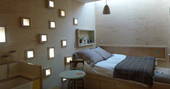 Bedroom interior at Brockloch Treehouse, Dumfries and Galloway