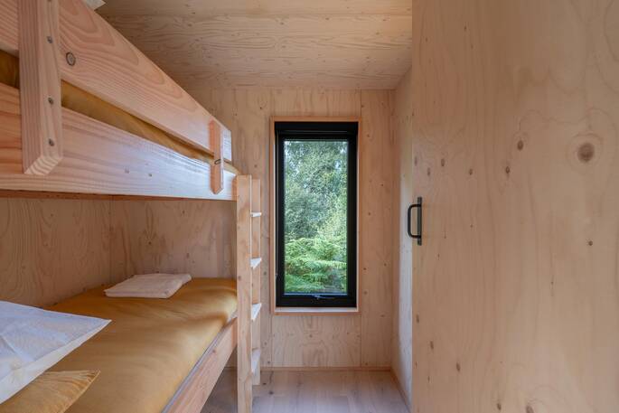 Bunk room with two single beds