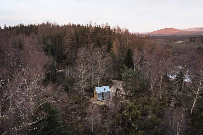 The Bothy Project in the woods, secluded, drone view, near Aviemore, Highland, Scotland