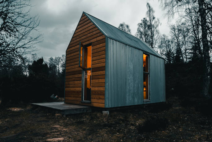 The mystical Bothy Project at dusk in Highland, Scotland