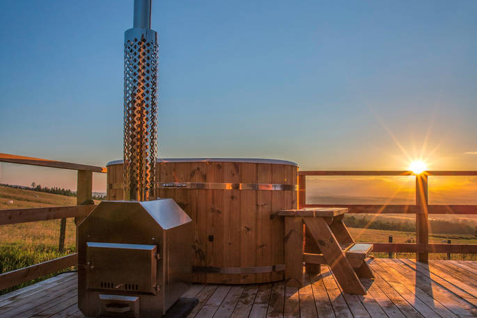 hot tub at sunset Heather Yurt, Alexander House, Auchterarder, Perth & Kinross, Scotland