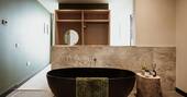 Bathroom with a freestanding bath tub