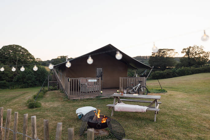 outdoor area with firepit and picnic table