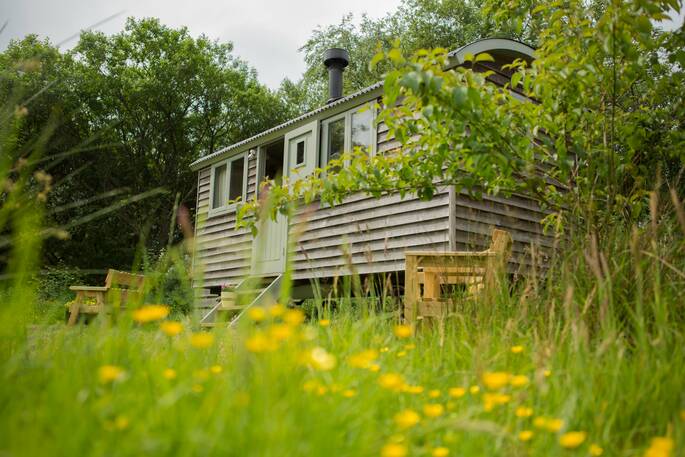 The quirky and charming Gwdihw shepherd's hut at Ty Cerrig, in the beautiful Welsh countryside near Cardiff