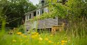 The quirky and charming Gwdihw shepherd's hut at Ty Cerrig, in the beautiful Welsh countryside near Cardiff