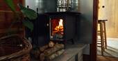 Wood burner with unlimited wood to keep warm