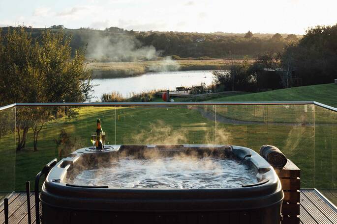 Jacuzzi  hot tub with a view to the river