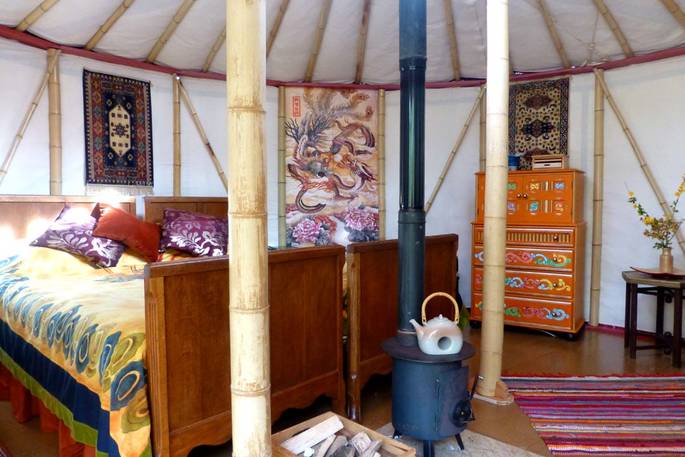 Bedroom interior at Waterfall Pagoda Yurt, Carmarthenshire