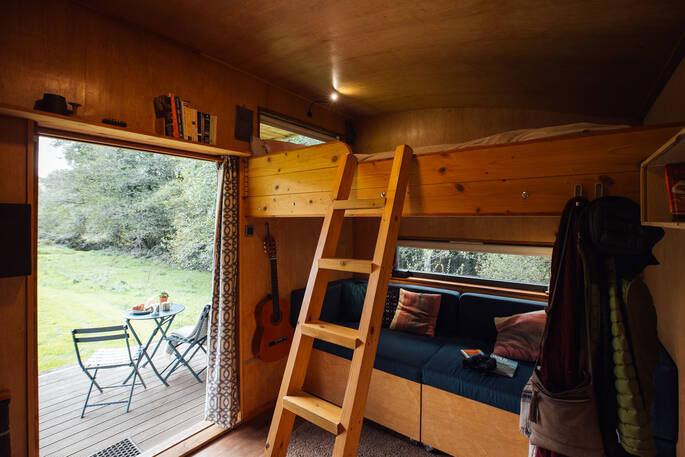 Ladder leading up to the bed on the mezzanine