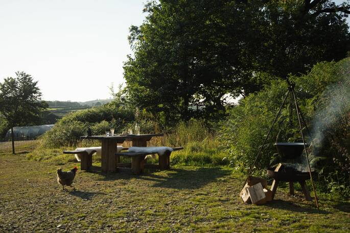 5 - Outdoor area with a firepit BBQ and picnic bench