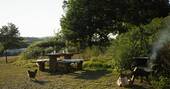 5 - Outdoor area with a firepit BBQ and picnic bench