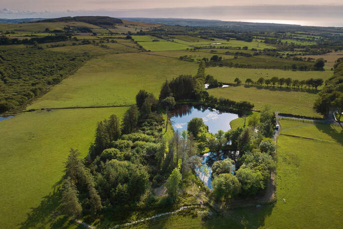 View from above with a view of the beach in the distance