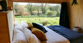 The Hide cabin - view from the bed, One Cat Farm, Lampeter, Ceredigion, Wales