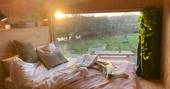 The Lookout cabin bedroom, One Cat Farm, Lampeter, Ceredigion, Wales